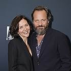 Maggie Gyllenhaal and Peter Sarsgaard at an event for Dopesick (2021)