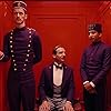 Ralph Fiennes, Tony Revolori, and Paul Schlase in The Grand Budapest Hotel (2014)