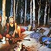 Paul Hogan, David Gulpilil, and Linda Kozlowski in Crocodile Dundee (1986)