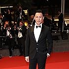 Raymond Lam at an event for Twilight of the Warriors: Walled In (2024)