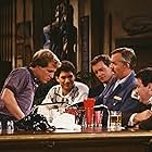 Woody Harrelson, John Ratzenberger, George Wendt, Tim Cunningham, Steve Giannelli, and Johnny Gilbert in Cheers (1982)