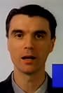 David Byrne in Talking Heads: Road to Nowhere (1985)