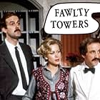 John Cleese, Connie Booth, and Andrew Sachs in Fawlty Towers (1975)