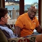Charlie Sheen and Michael Clarke Duncan in Two and a Half Men (2003)