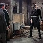Christopher Lee, Peter Cushing, and Robert Urquhart in The Curse of Frankenstein (1957)