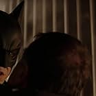Christian Bale and Tom Wilkinson in Batman Begins (2005)