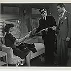 Dorothy Comingore, Fred Keating, and Peter Potter in Prison Train (1938)