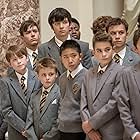 Asa Butterfield, Kit Connor, and Finn Cole in Slaughterhouse Rulez (2018)