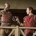 John Hannah and Peter Mensah in Spartacus: Gods of the Arena (2011)