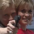 Radha Mitchell and Simon Wilton in Blue Heelers (1994)