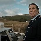 Ciarán Hinds in In the Land of Saints and Sinners (2023)