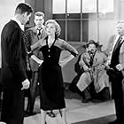 Robert Mitchum, William Conrad, Ray Collins, Robert Hutton, Robert Ryan, Walter Sande, and Lizabeth Scott in The Racket (1951)
