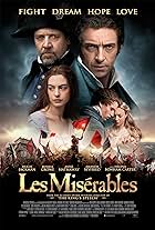 Russell Crowe, Anne Hathaway, Sacha Baron Cohen, Hugh Jackman, Amanda Seyfried, and Eddie Redmayne in Les Misérables (2012)