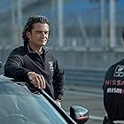 Orlando Bloom and Archie Madekwe in Gran Turismo (2023)