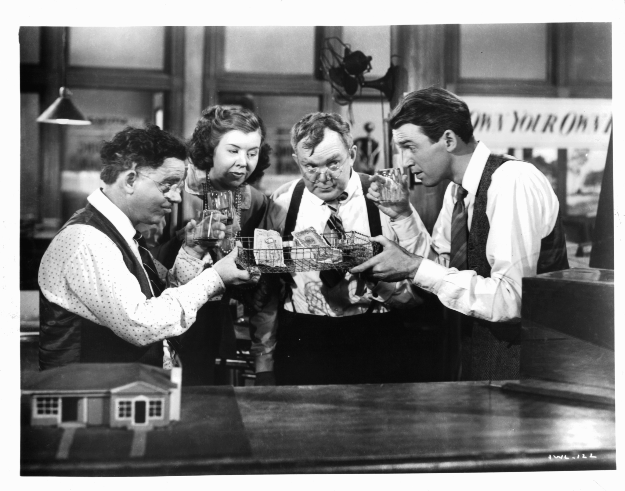 James Stewart, Thomas Mitchell, Mary Treen, and Charles Williams in It's a Wonderful Life (1946)