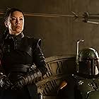 Ming-Na Wen and Temuera Morrison in The Book of Boba Fett (2021)