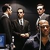 Laurence Fishburne, Paul Goddard, Robert Taylor, and Hugo Weaving in The Matrix (1999)