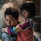 Park Ye-rin and Song Joong-ki in Space Sweepers (2021)