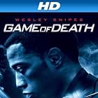 Wesley Snipes, Ernie Hudson, Zoë Bell, and Megan Brown Martinez in Game of Death (2011)