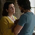 Melanie Lynskey and Peter Gadiot in Yellowjackets (2021)