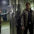 Eugene Byrd and David Ramsey in Arrow (2012)