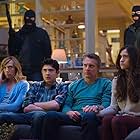 Toni Collette, Tate Donovan, Quinn Shephard, and Mateus Ward in Hostages (2013)
