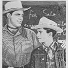 Robert 'Buzz' Henry and Robert Kellard in Tex Granger: Midnight Rider of the Plains (1948)