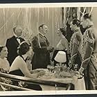 Wallace Beery, Maureen O'Sullivan, Robert Young, Russell Hardie, Rosalind Russell, and Lewis Stone in West Point of the Air (1935)
