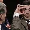 Rowan Atkinson and Richard Briers in Mr. Bean (1990)