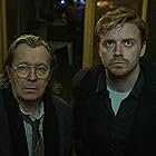 Gary Oldman and Jack Lowden in Failure's Contagious (2022)