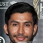 René Mena arrives at the opening night premiere of the Beverly Hills Film Festival at the TCL Chinese 6 Theatres on April 6, 2016 in Hollywood, California.