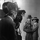 Ingrid Bergman, Humphrey Bogart, and Michael Curtiz in Casablanca (1942)