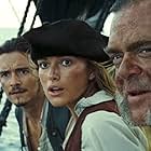Orlando Bloom, Keira Knightley, and Kevin McNally in Pirates of the Caribbean: Dead Man's Chest (2006)