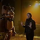 Emma Tammi, Kevin Foster, and Artie Esposito in Five Nights at Freddy's (2023)