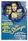 Edward G. Robinson, Orson Welles, and Loretta Young in The Stranger (1946)