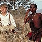 Corey Carrier and Isaac Senteu Supeyo in The Young Indiana Jones Chronicles (1992)