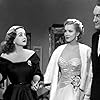 Bette Davis, Marilyn Monroe, Anne Baxter, and George Sanders in All About Eve (1950)