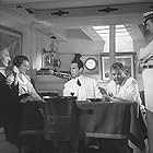 Mary Astor, Jerome Cowan, Raymond Massey, Thomas Mitchell, and C. Aubrey Smith in The Hurricane (1937)