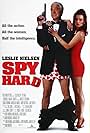 Leslie Nielsen and Nicollette Sheridan in Spy Hard (1996)