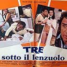 Walter Chiari, Lorraine De Selle, Aldo Maccione, and Venantino Venantini in Tre sotto il lenzuolo (1979)