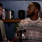 Max Greenfield and Lamorne Morris in New Girl (2011)