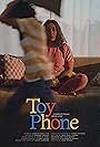Devin Looc and Karen Pittman in Toy Phone (2023)