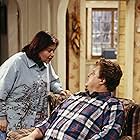John Goodman and Roseanne Barr in Roseanne (1988)