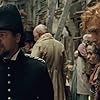 Russell Crowe and Sacha Baron Cohen in Les Misérables (2012)
