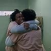 Uzo Aduba and Adrienne C. Moore in Orange Is the New Black (2013)