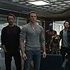 Don Cheadle, Robert Downey Jr., Bradley Cooper, Chris Evans, Sean Gunn, Scarlett Johansson, Jeremy Renner, Paul Rudd, and Karen Gillan in Avengers: Endgame (2019)