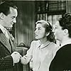 Joan Fontaine, Judith Anderson, and George Sanders in Rebecca (1940)