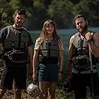 Adam Brody, Taran Killam, and Leighton Meester in River Wild (2023)