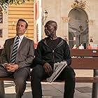 Guy Pearce and Eriq Ebouaney in Domino (2019)