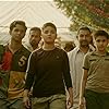 Aamir Khan, Ritvik Sahore, Zaira Wasim, and Suhani Bhatnagar in Dangal (2016)